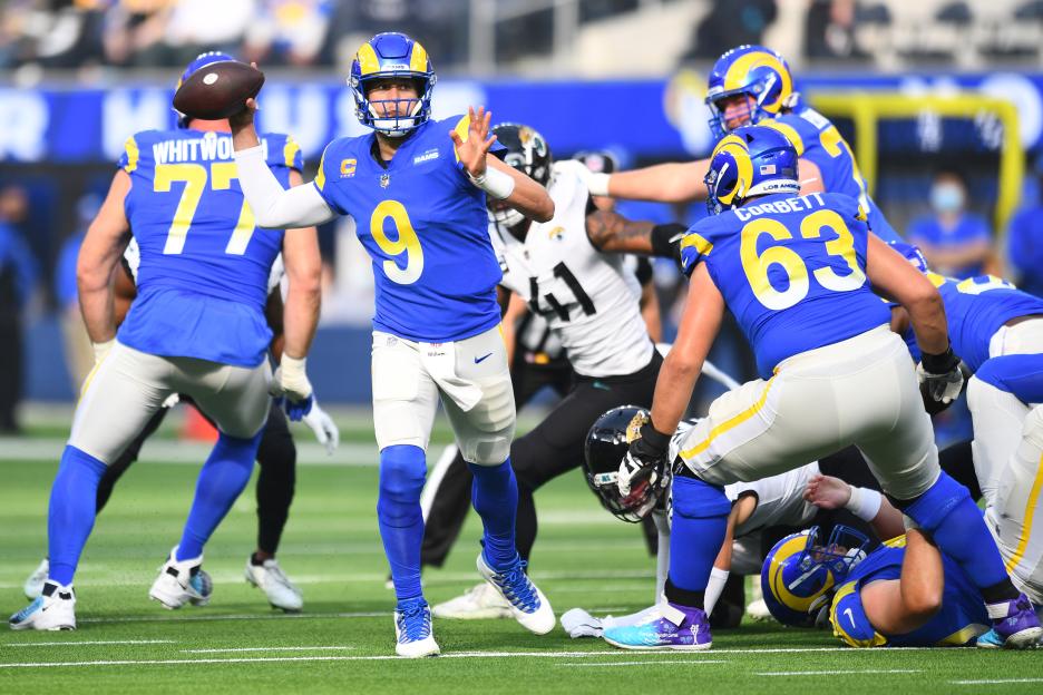 Los Angeles Rams quarterback Matthew Stafford (9) prepares to throw the ball during a football game.
