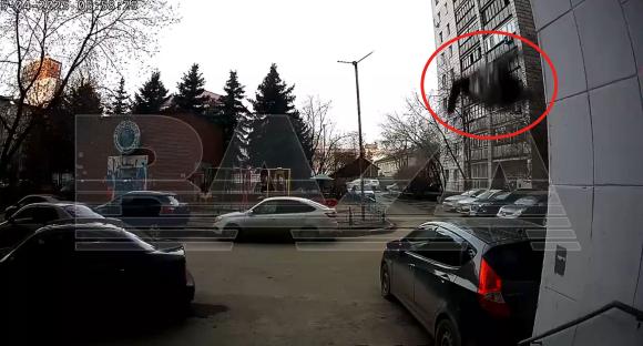 Shock moment Russian gran, 80, plunges SIX STOREYS & crushes car after falling while washing her windows… but SURVIVES