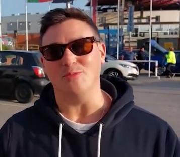 Ben, a Tottenham fan, wearing sunglasses and a dark hoodie.