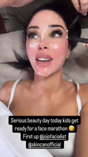 Woman receiving a facial treatment.