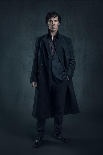 Benedict Cumberbatch as Sherlock Holmes in a dark coat.