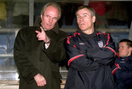 Sven Goran Eriksson and Peter Taylor, England's soccer coaches, discussing strategy.