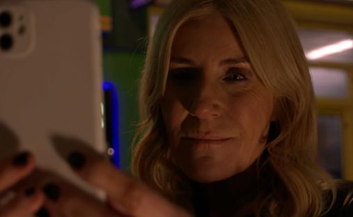 Woman looking at a smartphone.