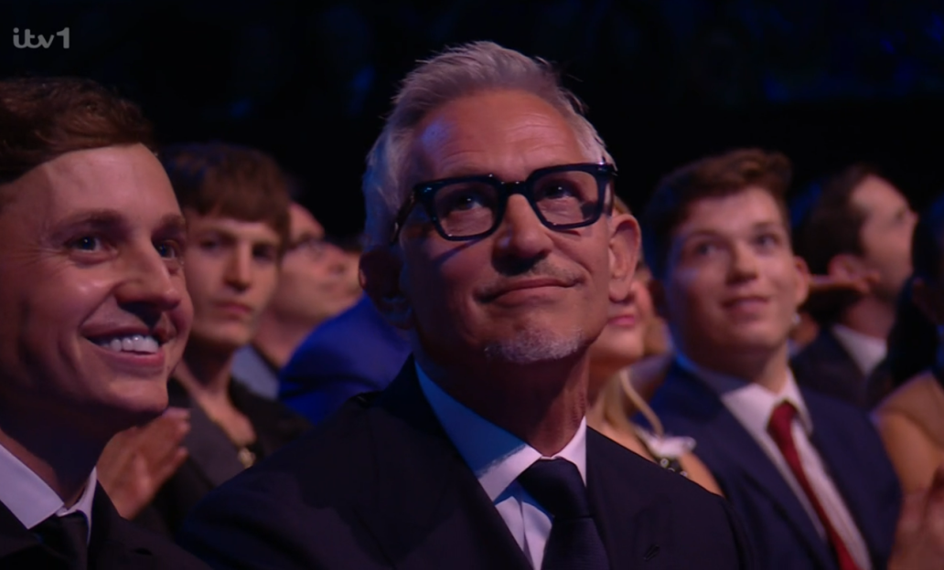Audience members at an awards ceremony.