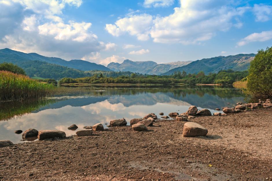 Elterwater reflecting The Langdale Pikes in the English Lake District.
