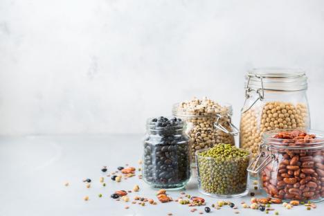 Assortment of legumes in jars.