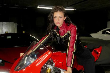 Brooklyn Beckham’s wife Nicola Peltz poses on £30k 189mph Ducati and shares pic of his unusual neck tattoos