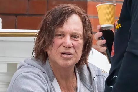 Hollywood hellraiser Mickey Rourke seen for first time since CBB axe as actor mopes on steps of posh London hotel