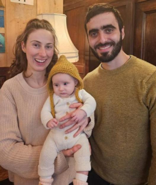 Vicky Freese-Brayer and Uriah with their daughter Naya.