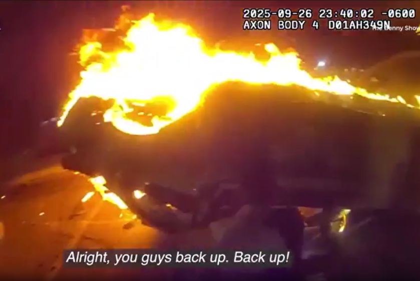 Bodycam footage of police pulling a victim from a burning vehicle.
