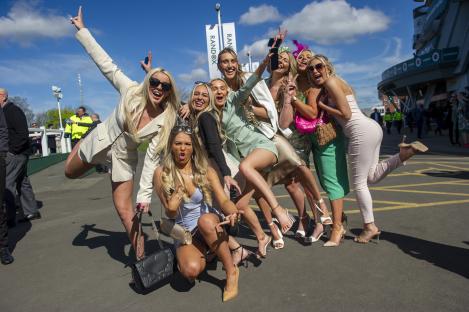 Group of women at a horse race.