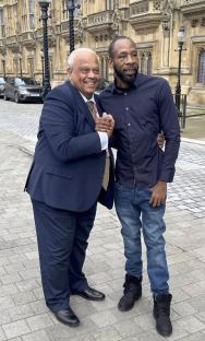 Rapper Bang Em Smurf meeting with Lord Michael Hastings outside the Houses of Parliament.