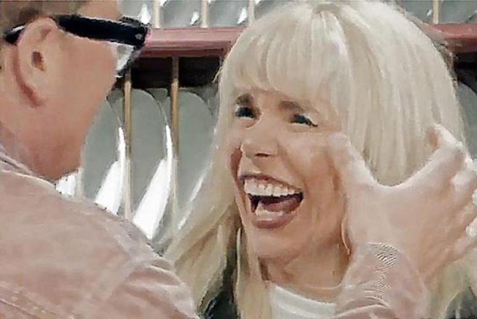 Alan Carr touching Paloma Faith's face, eliminating her on Celebrity Traitors.