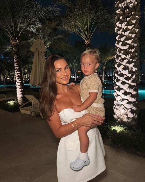 Sam Faiers holding her young son.