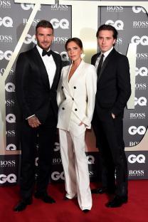 David, Victoria, and Brooklyn Beckham at the GQ Men Of The Year Awards.