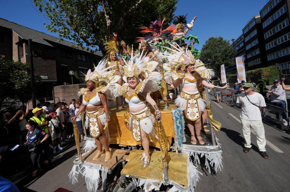 Dancers in elaborate costumes perform at the Notting Hill Carnival.