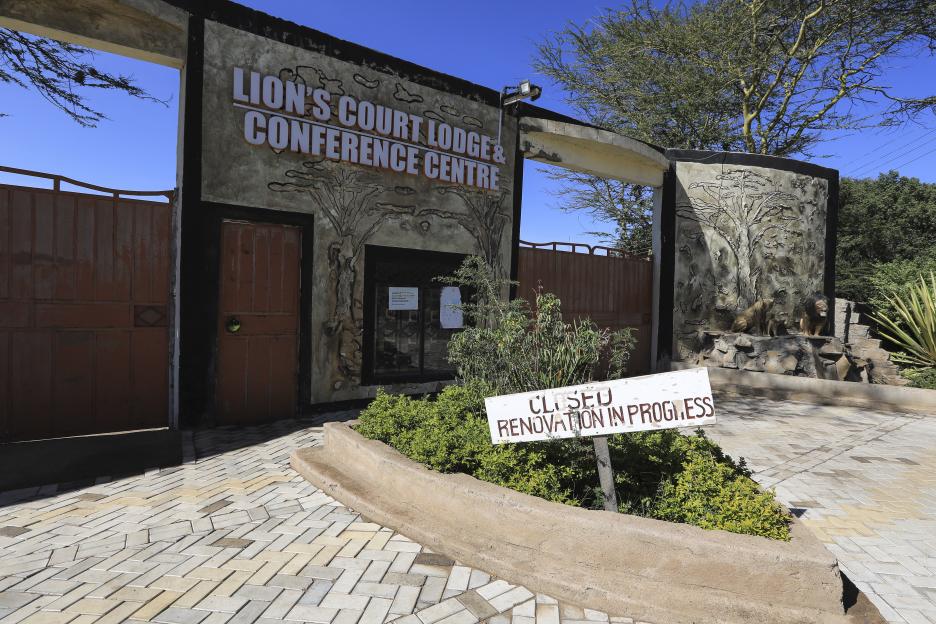 The main entrance of Lion's Court Lodge and Conference Centre, with a sign indicating "Closed, Renovation in Progress."