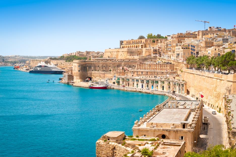 Grand Harbour and Valletta, Malta, with cruise ship and medieval walls.