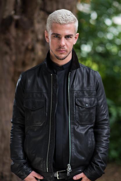Rory Douglas Speed in a black leather jacket.