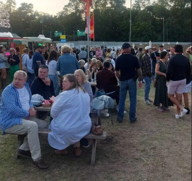 Rylan Clark with his boyfriend and mother at a festival.