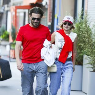 Bradley Cooper and Gigi Hadid walking together in New York City.