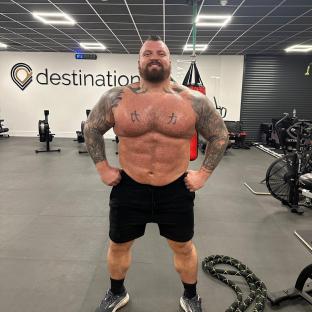 Eddie Hall in a gym, shirtless.