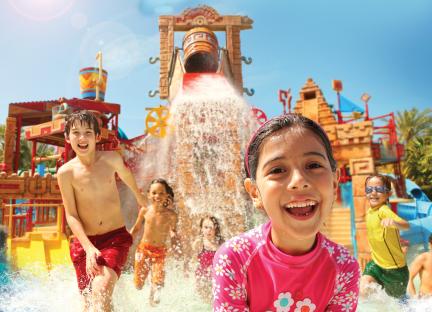 Children playing in a water park.