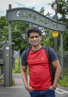 Oliver Harvey, The Sun's chief features writer, standing near a Greenway sign.