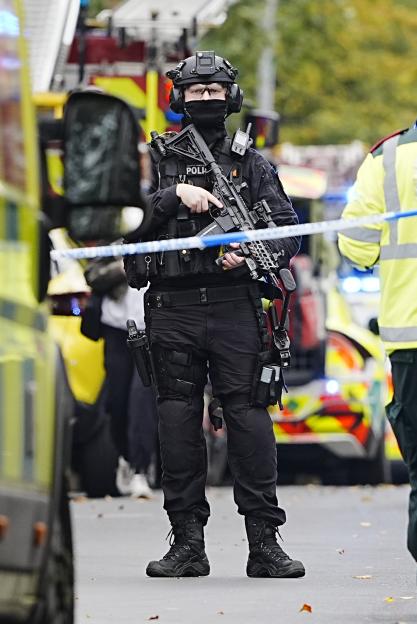 Armed police officer at the scene of an incident at Heaton Park Hebrew Congregation synagogue.