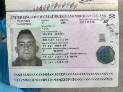 Passport photo and information for Andrew Joseph Cook.