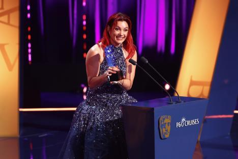Dianne Buswell accepting a BAFTA Television Award.