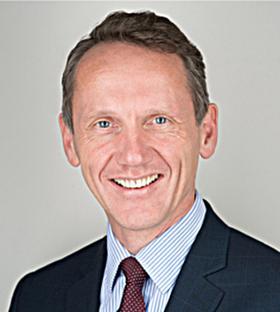 Headshot of Paul Tustain.