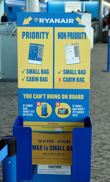Ryanair baggage size restrictions sign.
