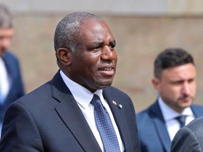 Head-and-shoulders portrait of a man in a suit.