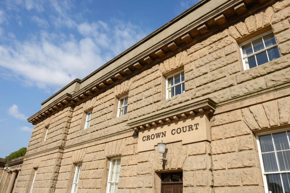 Chester Crown Court building with the words "CROWN COURT" visible above an entrance.