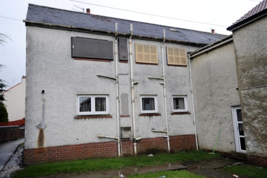 "Limbs in the Loch" killer William Beggs' top floor flat in Doon Place, Kilmarnock which is boarded-up and is still owned by the killer