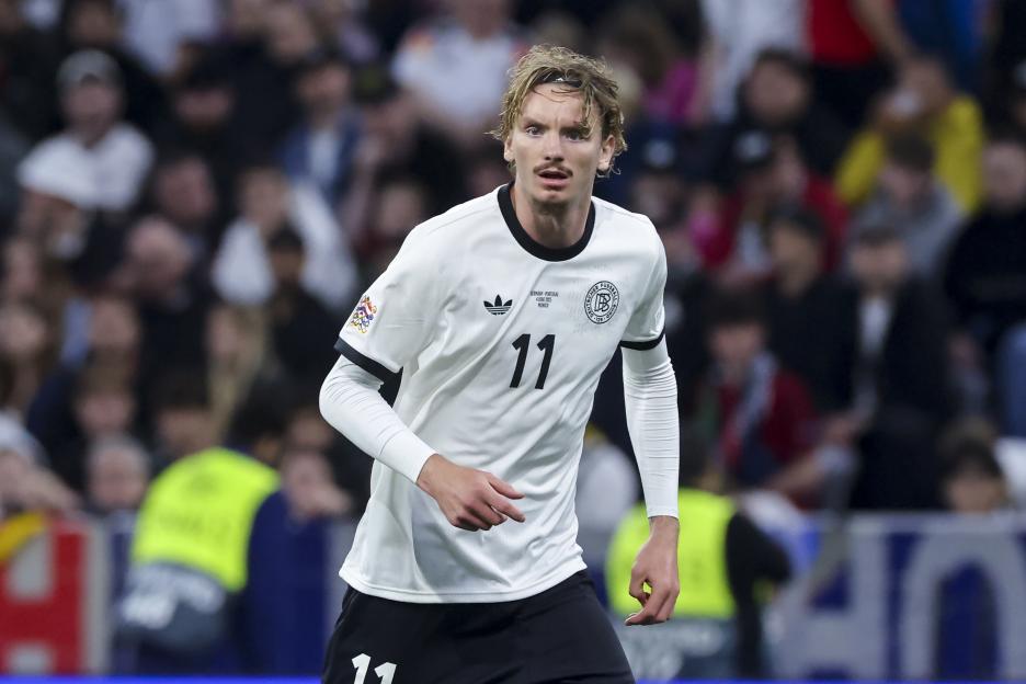 Nick Woltemade, German soccer player, wearing number 11.