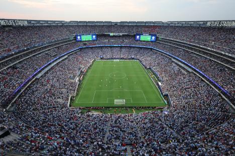 Aerial view of a crowded stadium during a soccer match.