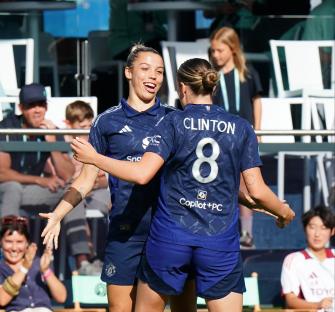 ESTORIL, PORTUGAL - MAY 21: Celin Bizet of Manchester United celebrates scoring her team's first goal with teammate Grace Clinton during the Group 2 match between AS Roma and Manchester United in the World Sevens Football on day one at Estadio Antonio Coimbra da Mota on May 21, 2025 in Estoril, Portugal. (Photo by Gualter Fatia/World Sevens Football via Getty Images)