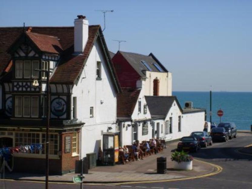 The Famous Ship Inn pub in Sandgate, Kent, overlooking the sea.