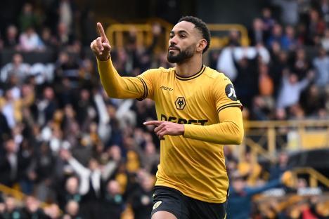 Matheus Cunha celebrates scoring a goal.