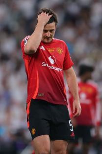 Harry Maguire of Manchester United looking dejected.