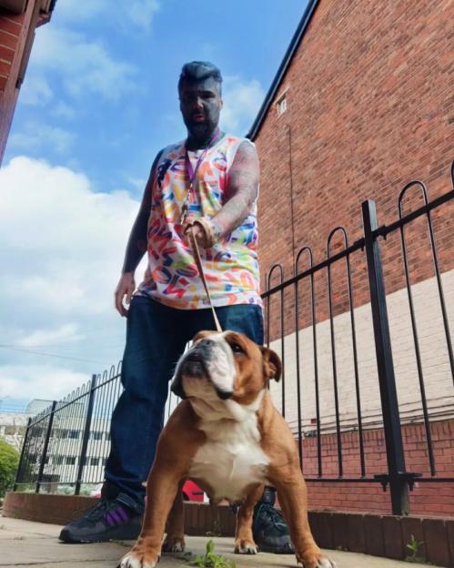 Story from Jam Press (Most Tattooed Man) Pictured: King Of Ink Land and his dog, Mary. 'Britain's Most Tattooed Man' is 'quitting the ink' to save money to pay off mortgage A man who has been dubbed Britains Most Tattooed Man reveals that hes giving up the ink for good until he clears his mortgage  but a new furry friend is helping him through. King Of Ink Land King Body Art The Extreme Ink-ite regularly hits the headlines due to his heavily inked look, where he says that the majority of his body is covered in colourful designs. Previously, the 43-year-old, revealed that his bank wouldnt let him open an account due to his new legal name, which used to be Mathew Whelan, that he has had since 2008. Now, the actor has revealed that hes giving up his lifestyle choice in a bid to clear his £66,000 mortgage and says he hopes to pay off the amount over the next four years. "Getting tattoos can be an addiction, however, this is a lifestyle for me, which I can start and pause whenever I please," King Of Ink Land, from Birmingham, told NeedToKnow.co.uk. Im taking a break from being inked while I concentrate on clearing my mortgage, so Ill be slowing down over the next few years. I might still get some ink every other year, but with interest rates going up, I hope to be mortgage-free in four years. I have a budgeting plan in place, and this means Ill have to limit my lifestyle, but Ill be happy to have that out of the way and done. King of Ink Land, who goes by Body Art for short, claims that hes spent over 1,500 hours under the needle and set the record in February 2016 when he had 36 tattooists work on him at once. While he hasnt kept track of the amount its cost him to date, he claims his bank manager would have rathered the money was kept in an ISA, rather than on his skin. Recently, hes welcomed an English Bulldog, Mary, 5, into his life, as hes always dreamed of having his own dog. And surp