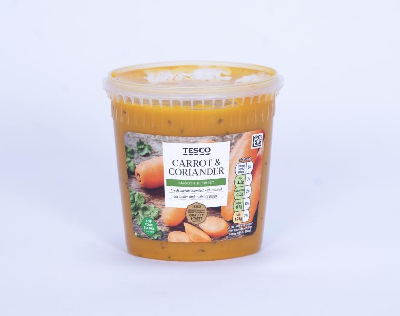 A plastic tub of Tesco Carrot & Coriander soup.