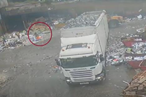 Shocking moment worker is CRUSHED by digger in horror accident on first day of his new job
