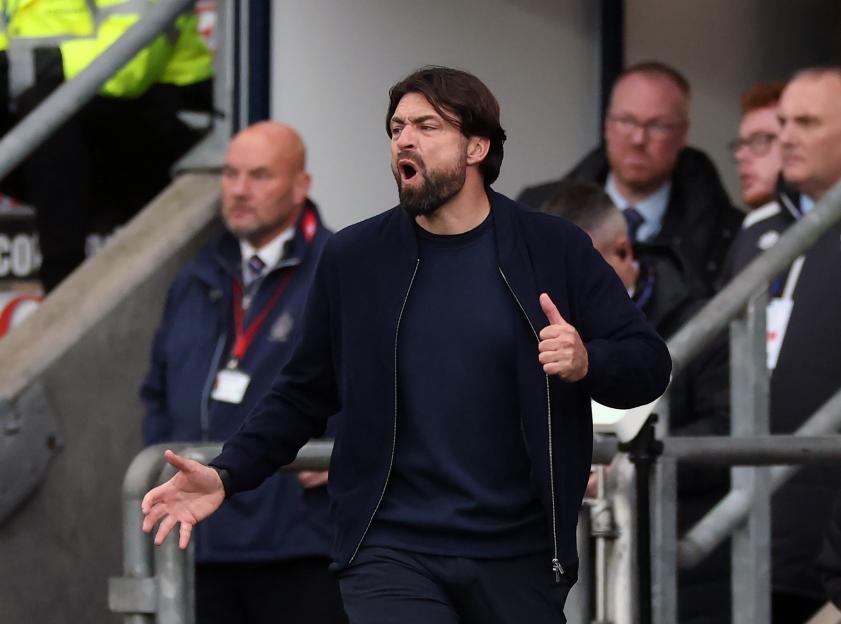 Rangers manager Russell Martin shouting and gesturing during a Premier League match.
