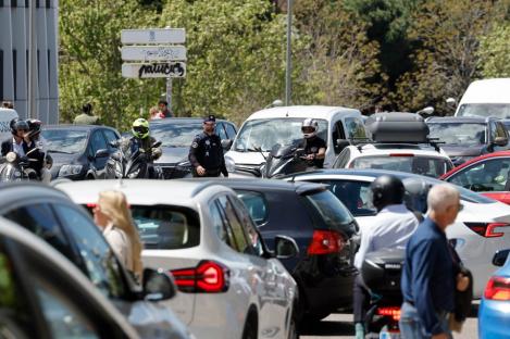 Traffic jam with police officers and motorcyclists.