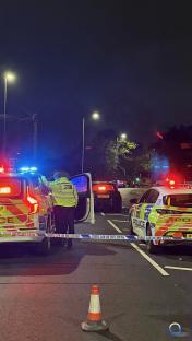 Police at night investigating a hit and run.