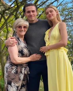 Couple celebrating with a woman.