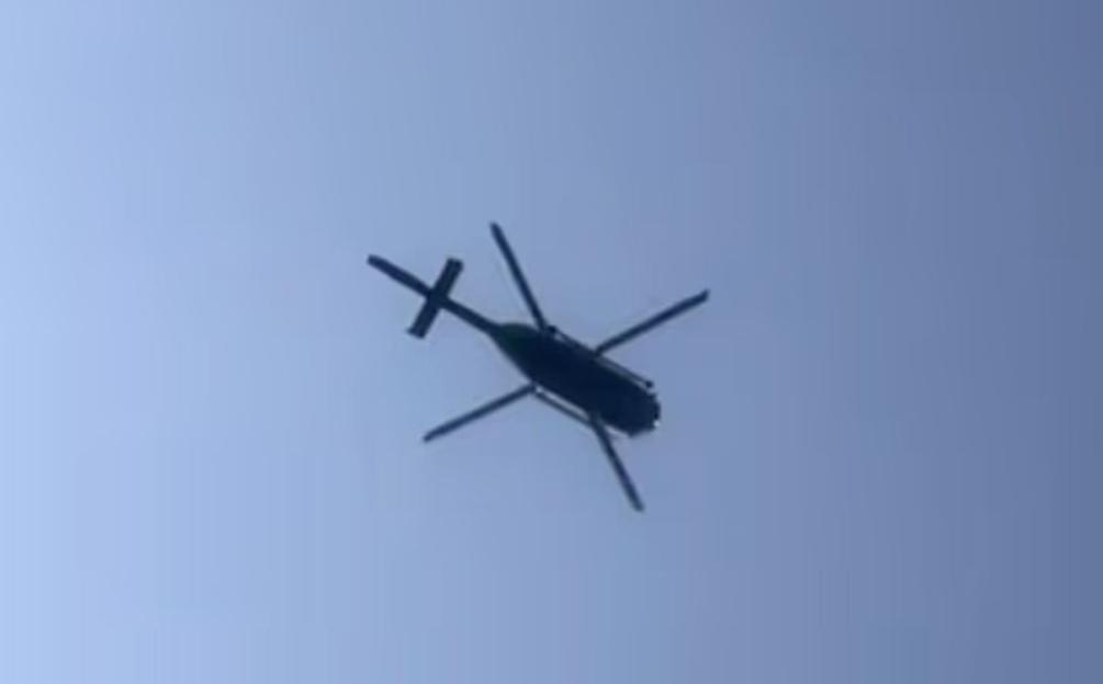 Helicopter flying overhead.